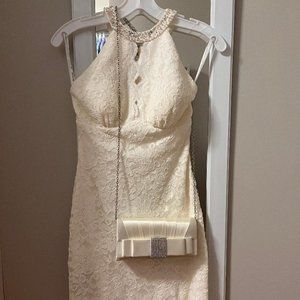 Size 4, Ivory color, David's Bridal Wedding dress with matching clutch